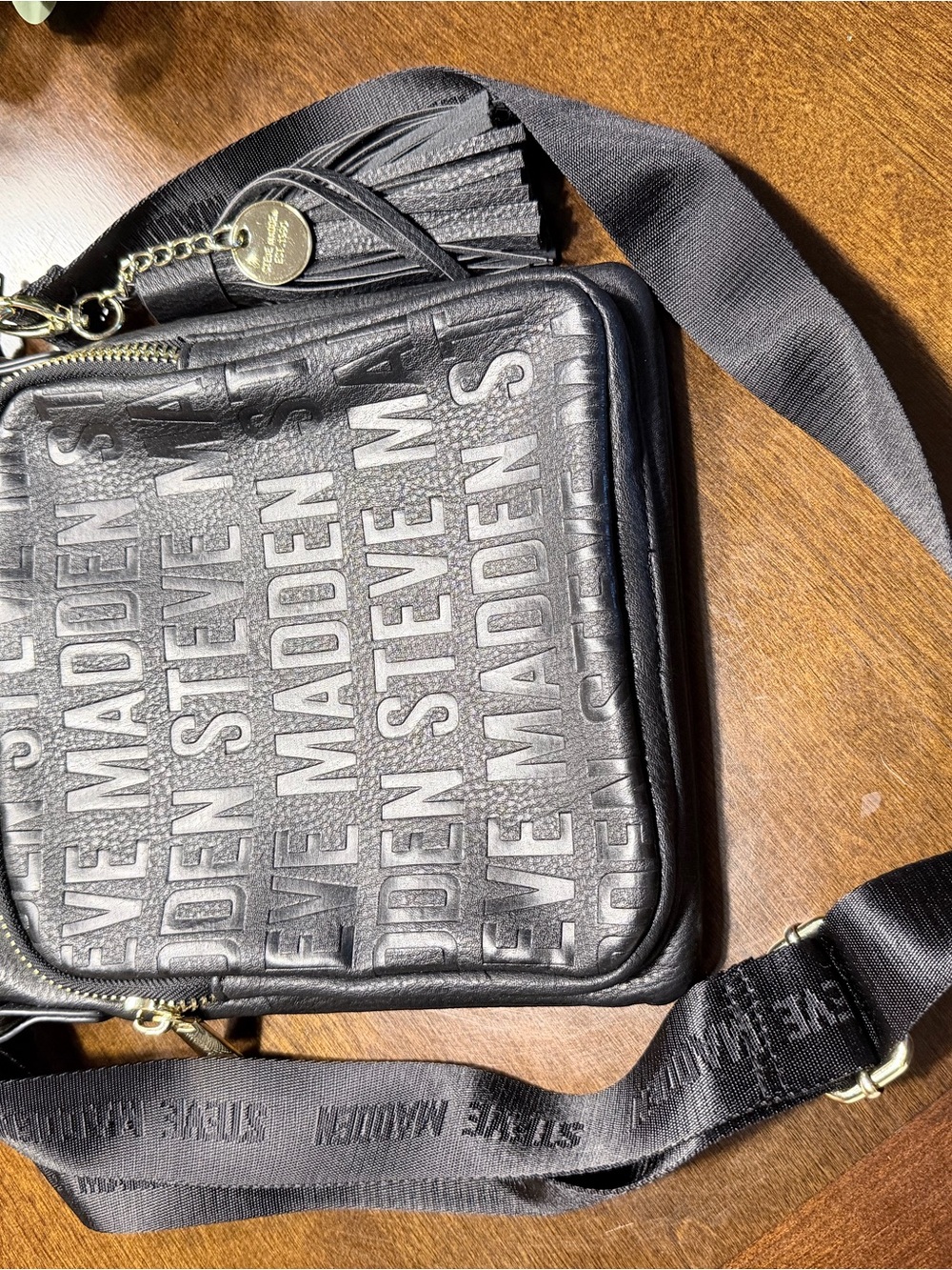 Steve Madden Black Embossed Logo Bag with Tassel